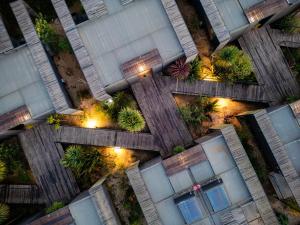 an overhead view of a building with plants and lights at Taka Matanzas in Matanzas