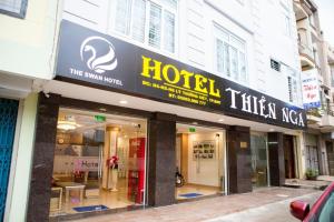 a hotel sign on the side of a building at Thien Nga Hotel in Buon Ma Thuot