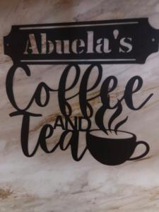 a sign that reads alitalias coffee party at La Abuela Hospitality in Dorado +2 photos