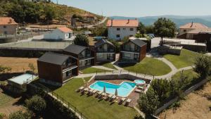 an aerial view of a house with a swimming pool at KV Residences 