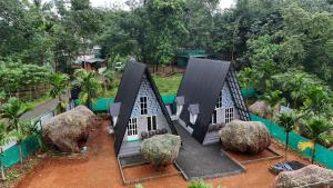an aerial view of a house in a garden at Sansa Villa in Athirappilly