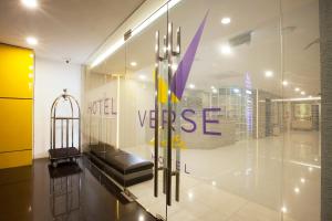 a large room with a large clock on the wall at Verse Lite Hotel Gajah Mada in Jakarta