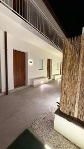 a room with two doors on the side of a building at San Lorenzo Palace in Reitani
