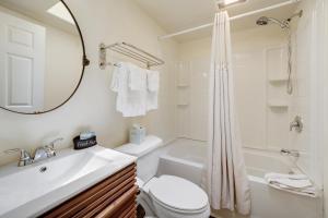 a bathroom with a sink toilet and a mirror at West Sonoma Inn & Spa in Guerneville +89 photos