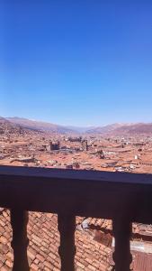 a view of a city from a viewing platform at Loki Cusco in Cusco +162 photos