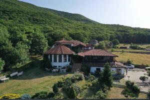 an aerial view of a house on a hill at Georgios Ranch in Tsodoreti