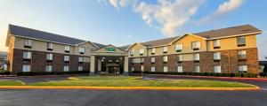 a rendering of a hotel with a parking lot at Quality Inn Texarkana Arkansas in Texarkana