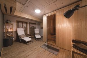 Telewizja i/lub zestaw kina domowego w obiekcie Luxury Chalet Mallnitz
