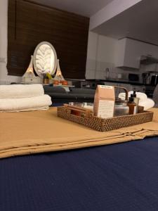 a tray of towels and towels on a table in a kitchen at Rutland Point in Uppingham