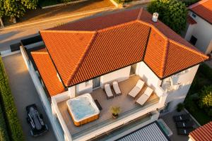 an overhead view of a house with a swimming pool at LUXURY MANDRE HOUSE in Mandre