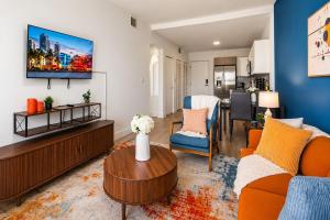 a living room with a couch and a table at Coastal Retreat Near Hollywood Beach & Casinos in Hallandale Beach