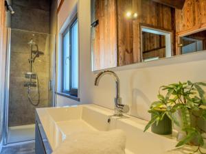 a bathroom with a sink and a shower at am Afritzer See in Afritz