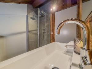 a bathroom with a sink and a shower at Berg und See in Afritz +31 photos