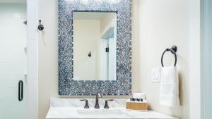 a bathroom with a sink and a mirror at The Top Shelf by AvantStay in Paso Robles +17 photos