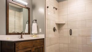 a bathroom with a sink and a shower at Paso Park Suites by AvantStay in Paso Robles +18 photos