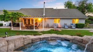 a house with a swimming pool in the yard at Summer Place by AvantStay in Templeton
