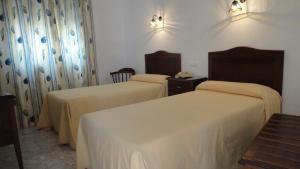 Кровать или кровати в номере PARAISO PLAYA Hotel