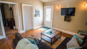 a living room with a couch and a coffee table at Baby Bliss by AvantStay in Paso Robles