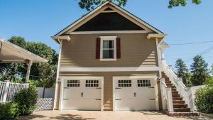 a house with two garage doors in a driveway at Baby Bliss by AvantStay in Paso Robles