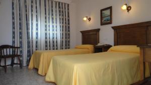 Кровать или кровати в номере PARAISO PLAYA Hotel