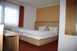 Postel nebo postele na pokoji v ubytování Landhaus Seehof