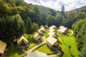an aerial view of a group of tents in a forest at Landal Namur Nature in Gesves