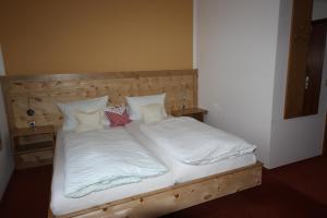 Postel nebo postele na pokoji v ubytování Landhaus Seehof