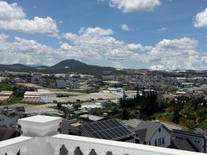 a view of a city from the roof of a building at Celine Privé - Dalat Hotel in Da Thien
