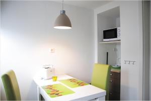 Kuchyň nebo kuchyňský kout v ubytování Ferienwohnung in Sassnitz
