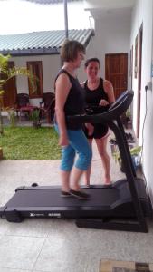 two women are standing on a treadmill at The Ramp Udawalawe in Udawalawe