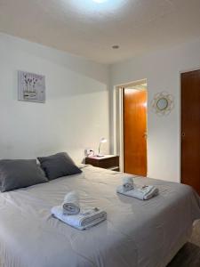 Una cama o camas en una habitación de MS Hotel Campos 26 87 fotos más