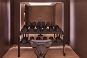 a room with a rack of wine bottles at MiM Andorra member of Meliá Collection in Escaldes-Engordany