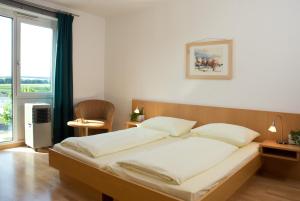 Postel nebo postele na pokoji v ubytování Hotel GIP