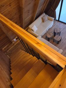 an overhead view of a living room with a couch at Max view Chalet Žabljak in Žabljak