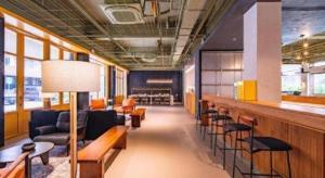 a waiting room with couches and a bar at H Life Hotel in Shenzhen