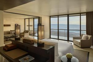 a living room with a view of the ocean at Alila Seminyak in Seminyak