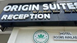 a sign that reads urban suites reception on a building at The Origin Suites opposite Hyatt Dlf my pad Lucknow in Lucknow