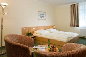 Postel nebo postele na pokoji v ubytování Hotel GIP + 17 fotografií