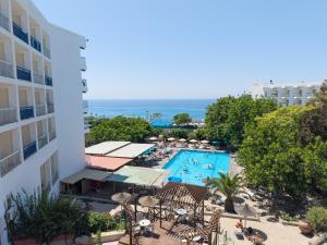 a view of a swimming pool and a hotel at Marina Hotel in Ayia Napa