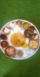 a plate of food on top of the grass at الشريف in Irbid