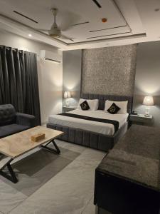 Krevet ili kreveti u jedinici u okviru objekta Palmtree Hotel