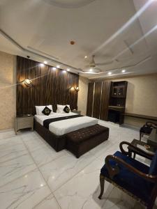 Krevet ili kreveti u jedinici u okviru objekta Palmtree Hotel +43 fotografije