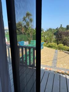 a view from a window with a view of a pool at Cozy Home Buknari in Buknari