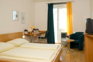 Postel nebo postele na pokoji v ubytování Hotel GIP