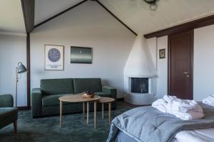 Uma área de estar em Green Hotel