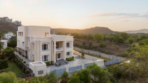 an aerial view of a white house at Chez Lavania - A Boutique Stay in Udaipur
