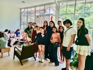 a group of women posing for a picture in a room at Sweed Dee Love Hostel in Phi Phi Islands