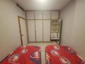 a small room with a bed and a closet at Chalet 1BR 1BA with Beach&Pool&Tennis&Basketball in Jounieh +7 photos