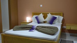 Postel nebo postele na pokoji v ubytování LT Aparthotel + 37 fotografií