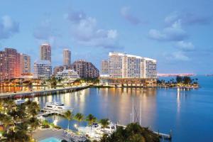 a view of a city with a harbor and buildings at Mandarin Oriental Miami in Miami